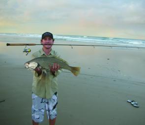 Gold Coaster Ben Hockard is one of a growing band of people throwing medium to light soft plastics in the surf for bream, flathead and nice school jew like this one.